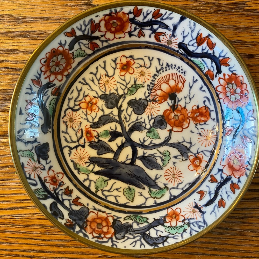 Vintage Chinoiserie porcelain and brass bowl.